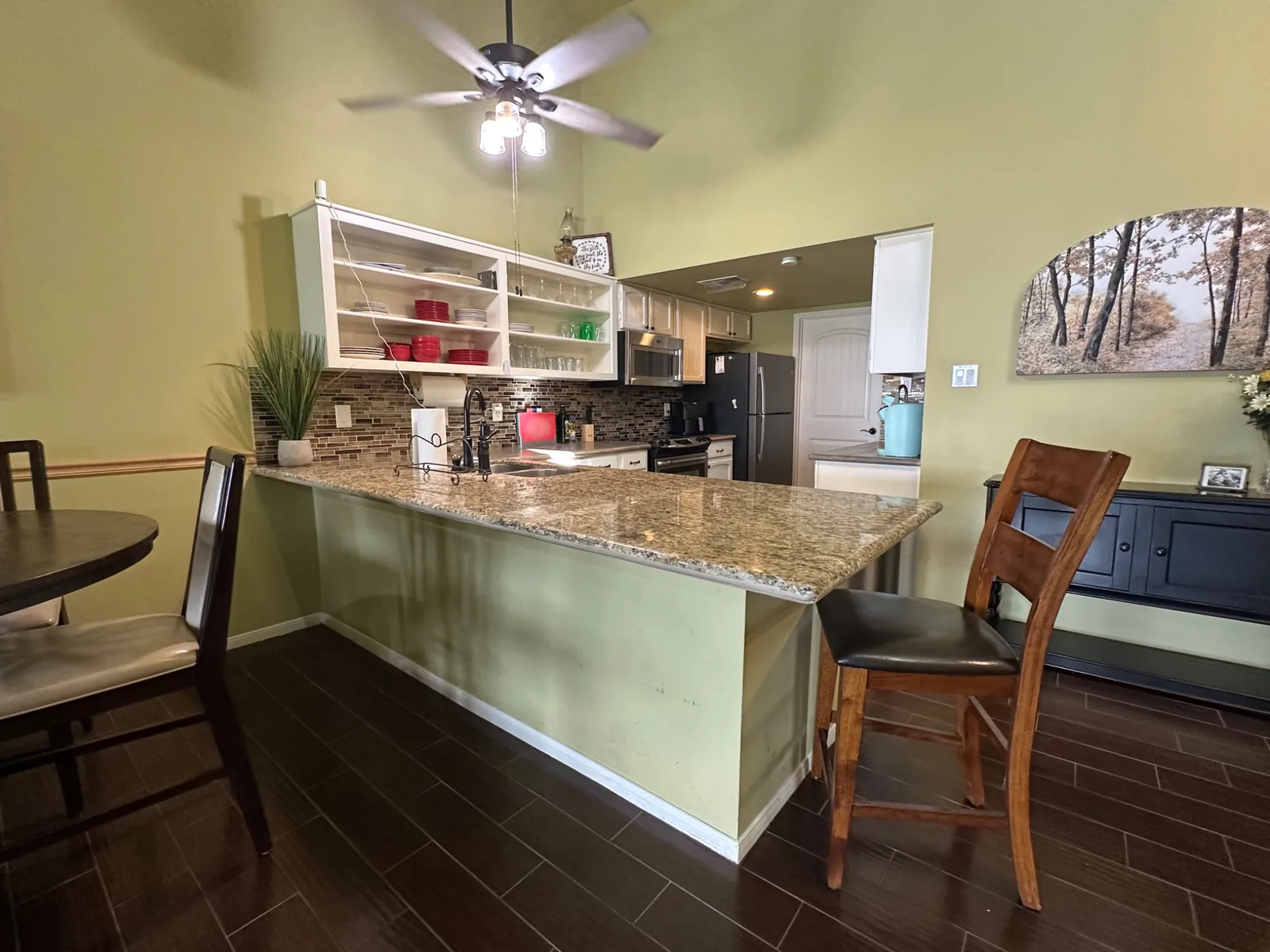 Kitchen and breakfast bar at Casa Sunset Lake Conroe